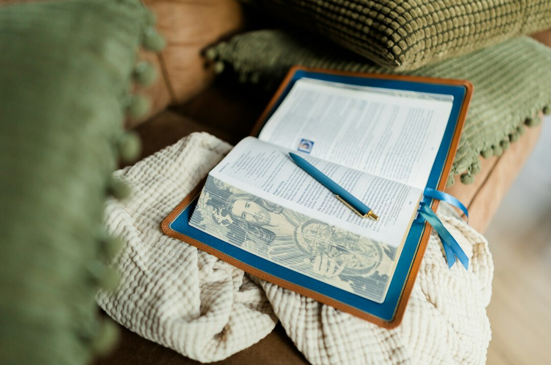 Open journal and pen on a desk